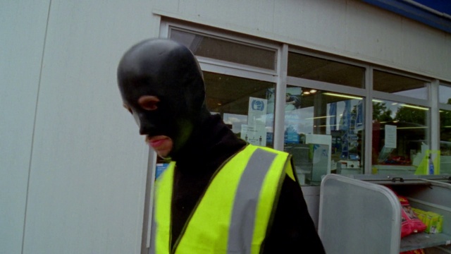 Video Reference: High-visibility clothing, Sleeve, Headgear, Workwear, Personal protective equipment, T-shirt, Sports gear, Audio equipment, Security, Beard