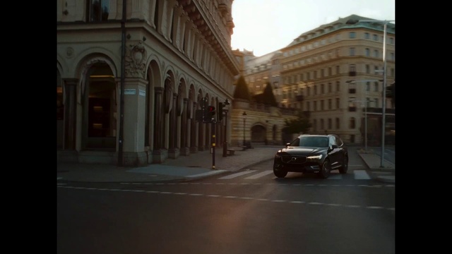 Video Reference: Building, Window, Automotive lighting, Car, Vehicle, Wheel, Tire, Road surface, Thoroughfare, Automotive design