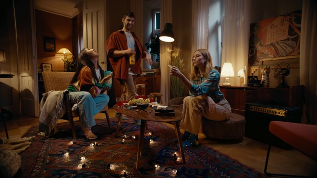 Video Reference: Picture frame, Lighting, Comfort, Lamp, Wood, Flooring, Couch, Leisure, Living room, Event