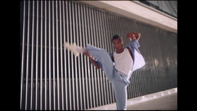 Video Reference: Sports uniform, Dobok, Gesture, Martial arts uniform, T-shirt, Flash photography, Karate, Happy, Font, Sportswear
