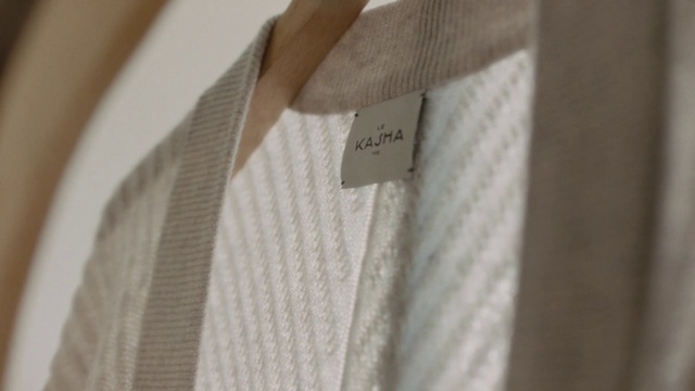 Video Reference: Dress shirt, Sleeve, Collar, Wood, Beige, Rectangle, Blazer, Formal wear, Font, Pattern