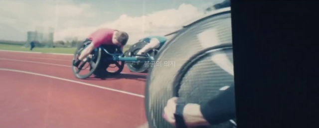 Video Reference: Wheel, Sky, Bicycles--Equipment and supplies, Cloud, Automotive tire, Tire, Wheelchair sports, Bicycle handlebar, Disabled sports, Motor vehicle