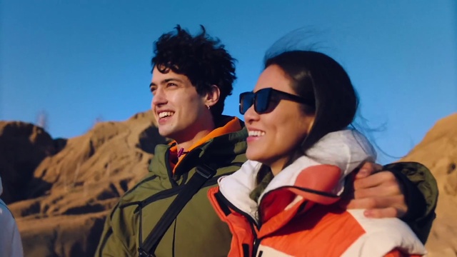 Video Reference: Smile, Sky, Goggles, Vision care, Gesture, Happy, Travel, Outdoor recreation, Glove, Eyewear