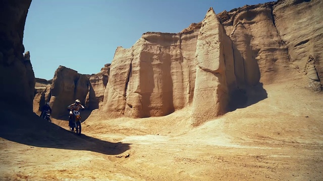 Video Reference: Sky, Ecoregion, Bedrock, Landscape, Formation, Tints and shades, Sand, Outcrop, Aeolian landform, Valley
