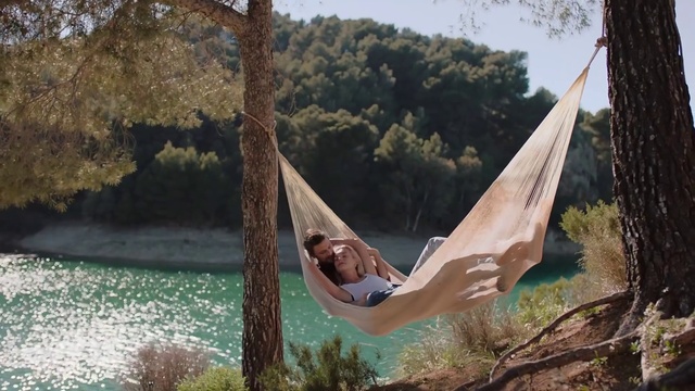Video Reference: Hammock, Plant, Water, People in nature, Tree, Happy, Shade, Swing, Grass, Woody plant