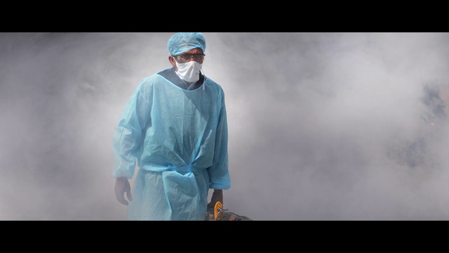 Video Reference: Flash photography, Sleeve, Gesture, Cloud, Sky, Workwear, Medical, Electric blue, Service, Personal protective equipment