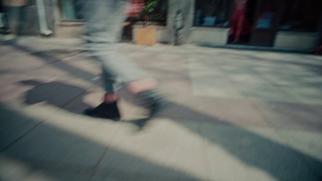 Video Reference: Road surface, Asphalt, Finger, Flooring, Floor, Sidewalk, Tints and shades, Thigh, Recreation, Human leg