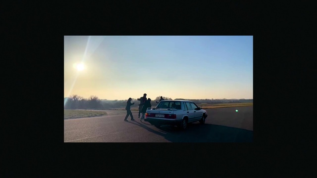 Video Reference: Sky, Car, Vehicle, Automotive lighting, Tire, Automotive mirror, Gesture, Rolling, Rear-view mirror, Landscape