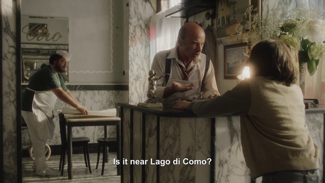 Video Reference: Table, Interaction, Adaptation, Picture frame, Event, T-shirt, Conversation, Room, Plant, Visual arts