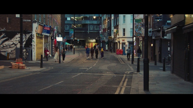 Video Reference: Building, Road surface, Window, Asphalt, Thoroughfare, Urban design, Sidewalk, Morning, Road, City