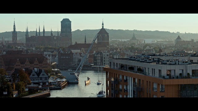 Video Reference: Water, Sky, Watercraft, Boat, Building, Cityscape, Tower, Waterway, City, Urban design