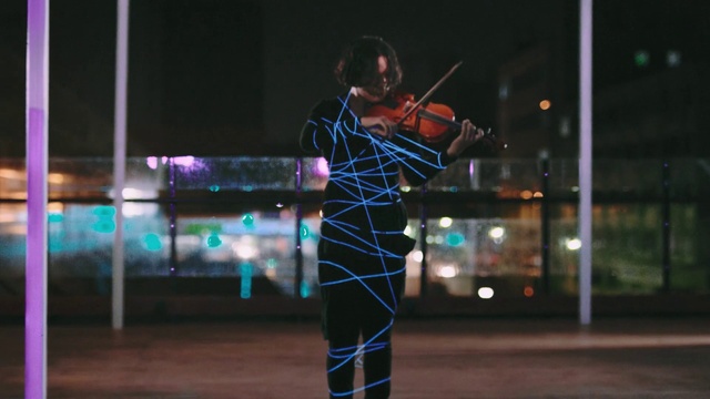 Video Reference: Flash photography, Entertainment, Musical instrument, Performing arts, Electricity, Performance art, Violin, Electric blue, Event, Darkness