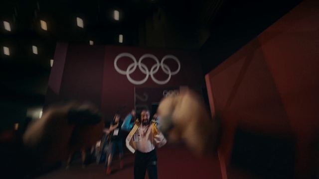 Video Reference: Flash photography, Entertainment, Event, Performing arts, Font, Magenta, Space, Fashion design, Darkness, Electric blue