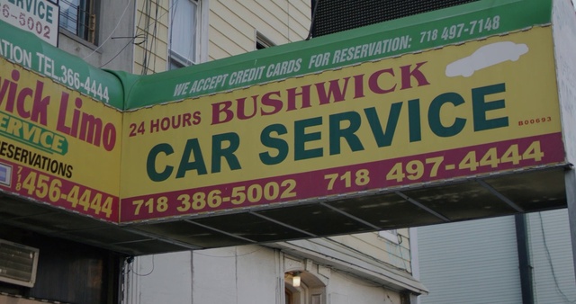 Video Reference: Building, Fixture, Window, Font, Real estate, Facade, Advertising, Signage, Sign, Billboard