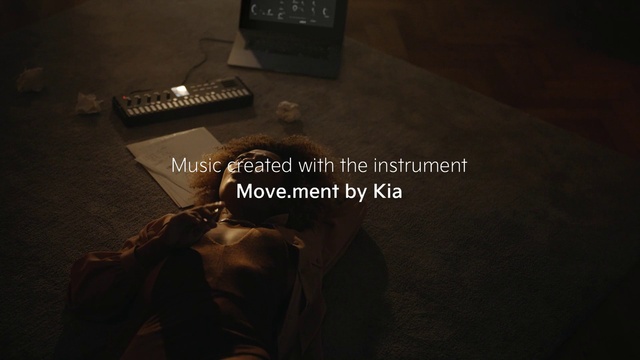 Video Reference: Flash photography, Sleeve, Font, Musical instrument, Office equipment, Darkness, Wood, Musical instrument accessory, Flooring, Guitar accessory