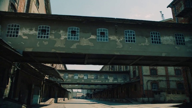 Video Reference: Sky, Window, Building, Shade, Urban design, Facade, City, Commercial building, Mixed-use, Metal