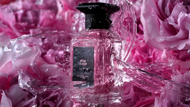 Video Reference: Liquid, Perfume, Purple, Drinkware, Fluid, Automotive lighting, Petal, Pink, Violet, Glass bottle