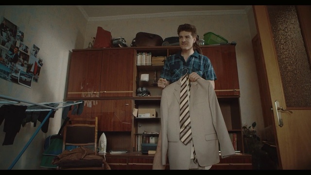 Video Reference: Wood, Fashion design, Flooring, Shelving, Hardwood, Shelf, Event, Formal wear, Vintage clothing, Room