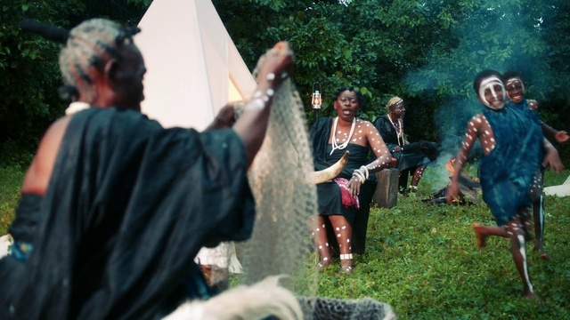 Video Reference: Plant, Temple, Gesture, Tree, Leisure, Grass, Event, Pole, Fun, Crowd