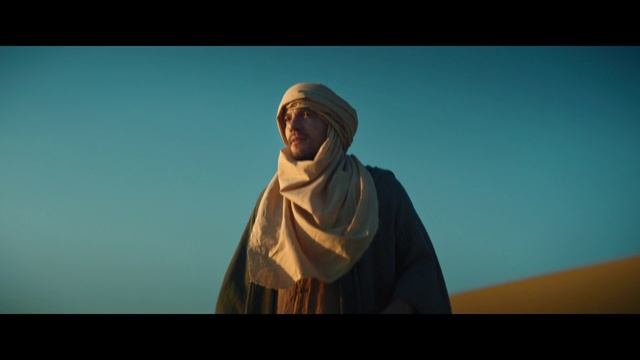 Video Reference: Sky, Landscape, Art, Tints and shades, Sculpture, Monument, Statue, Electric blue, Aeolian landform, Turban