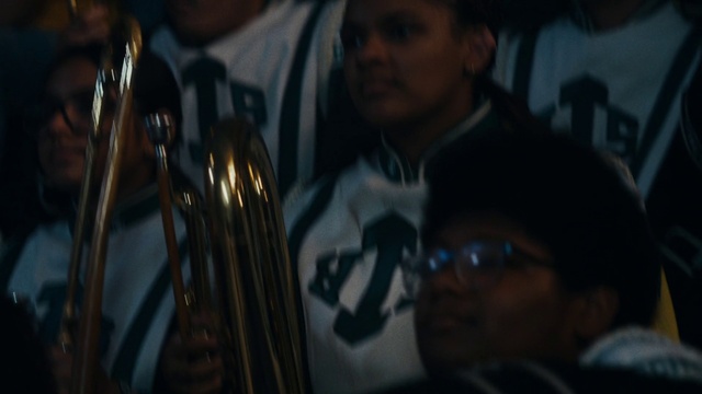 Video Reference: Darkness, Event, Eyewear, Electric blue, Wind instrument, Woodwind instrument, Glass, Brass instrument, Music, Night