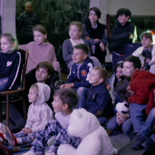 Video Reference: Face, Purple, Lap, Jacket, Event, Child, Hat, Fun, Leisure, Toddler