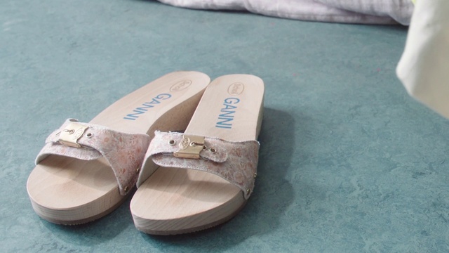 Video Reference: Footwear, Beige, Human leg, Electric blue, Fashion accessory, Wood, Font, Event, Peach, Fashion design