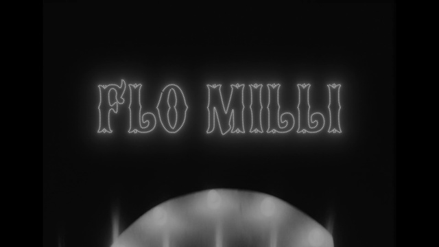 Video Reference: Flash photography, Grey, Font, Handwriting, Automotive lighting, Automotive design, Automotive tire, Darkness, Monochrome photography, T-shirt