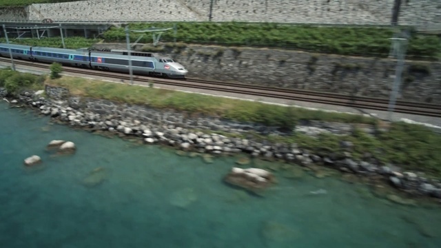 Video Reference: Water, Train, Vehicle, Plant, Rolling, Waterway, Urban design, Landscape, Railway, Grass