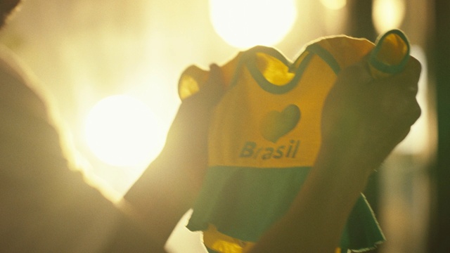 Video Reference: Gesture, Yellow, Finger, Font, Happy, Tints and shades, Lens flare, Grass, Event, Thumb