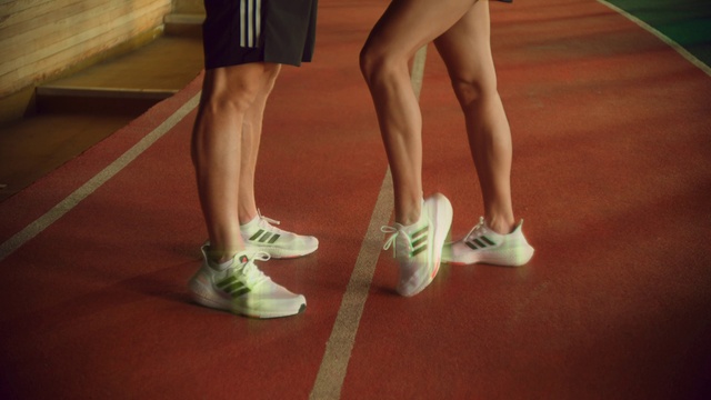 Video Reference: Footwear, Shoe, Active shorts, Leg, Human body, Knee, Calf, Thigh, Sneakers, Sock