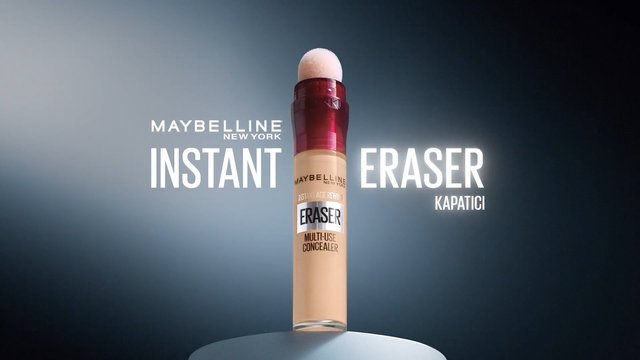 Video Reference: cosmetics, concealer, makeup, Maybelline, product shot, advertisement, beauty, bottle, branding, studio lighting, blue background, close-up, packaging, promo text