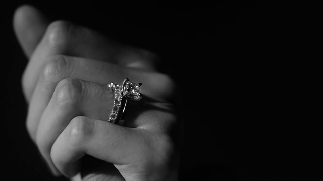 Video Reference: Body jewelry, Flash photography, Wedding ring, Pre-engagement ring, Gesture, Engagement, Finger, Engagement ring, Wedding ceremony supply, Wrist