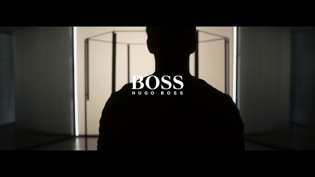 Video Reference: Neck, Sleeve, T-shirt, Font, Tints and shades, Flash photography, Darkness, Room, Backlighting, Cross