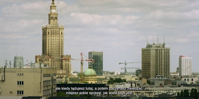 Video Reference: Sky, Cloud, Building, Skyscraper, Tower, Window, Tower block, Urban design, Condominium, Clock