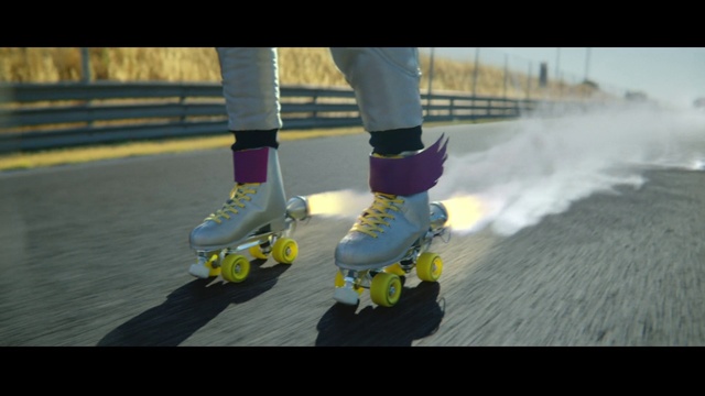 Video Reference: Footwear, Sports equipment, Leg, Human body, Street fashion, Thigh, Asphalt, Knee, Roller skating, Roller skates