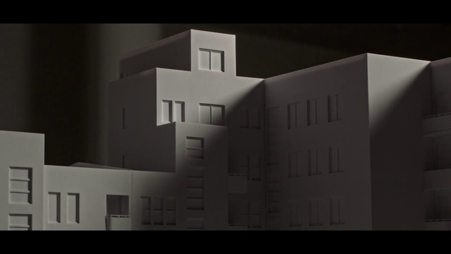 Video Reference: Rectangle, Building, Font, Wall, Art, House, Wood, Facade, Space, Composite material