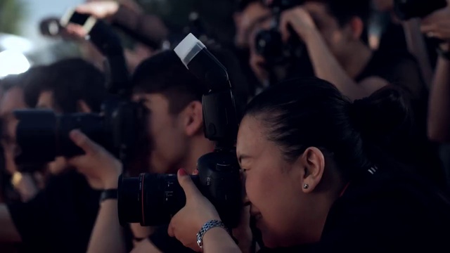 Video Reference: Hairstyle, Photograph, Fashion, Flash photography, Hat, Purple, Gesture, Eyewear, Interaction, Black hair