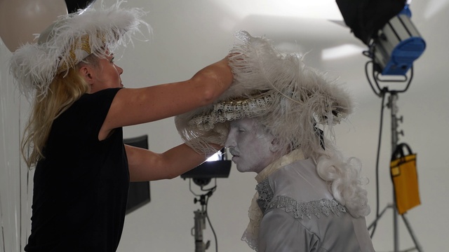 Video Reference: White, Gesture, Headgear, Earrings, Feather, Headpiece, Fashion design, Happy, Bridal accessory, Fun