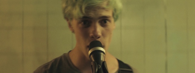 Video Reference: Nose, Microphone, Cheek, Shirt, Jaw, Beard, Audio equipment, Musician, Music artist, Performing arts