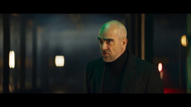 Video Reference: Sky, Event, Flash photography, Darkness, Public speaking, Elder, Room, Night, Portrait