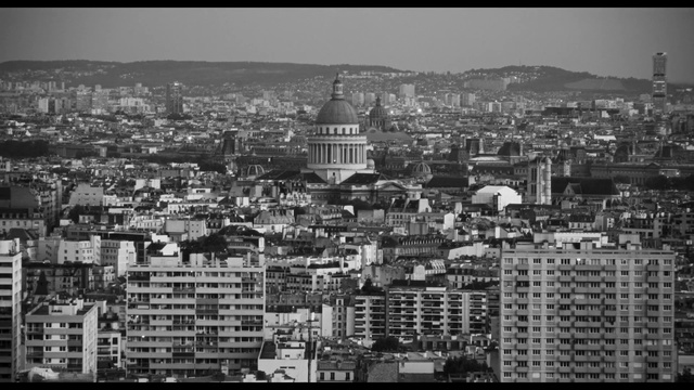 Video Reference: Sky, Building, World, Black, Black-and-white, Window, Style, Tower block, Urban design, Cityscape