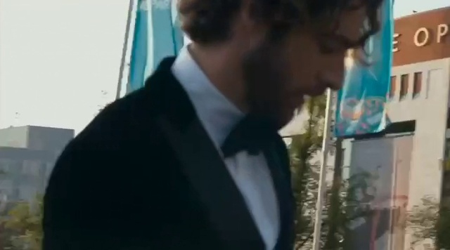 Video Reference: Dress shirt, Sleeve, Tie, Gesture, Collar, Blazer, Suit, Formal wear, Beard, White-collar worker