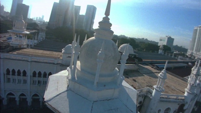 Video Reference: Sky, Window, World, Building, Finial, Art, Landmark, Sculpture, City, Cloud