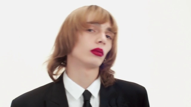 Video Reference: Face, Lip, Chin, Eyebrow, Eyelash, Dress shirt, Jaw, Neck, Sleeve, Coat