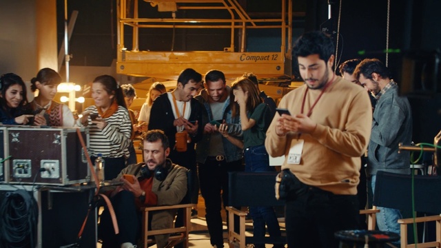 Video Reference: Jeans, Trousers, Chair, Musician, Music, Jacket, Engineering, Event, Conversation, Crowd