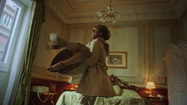 Video Reference: Wood, Interior design, Comfort, Flooring, Window, Tints and shades, Ceiling, Musical instrument, Art, Event