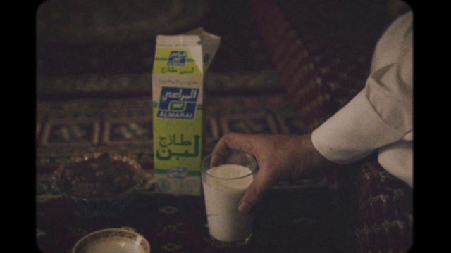 Video Reference: Gesture, Drink, Tints and shades, Food, Darkness, Font, Wrist, Human leg, Soil, Flash photography