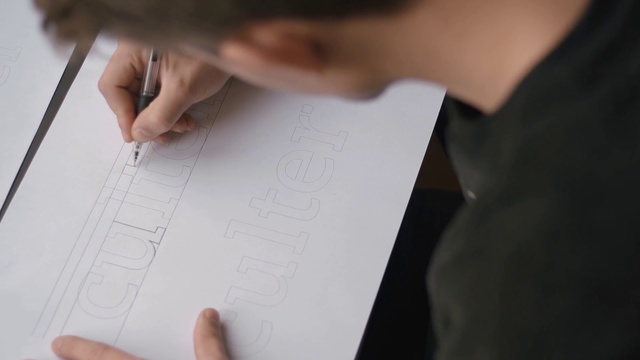 Video Reference: Hand, Handwriting, Gesture, Automotive design, Finger, Writing instrument accessory, Office supplies, Nail, Font, Writing implement