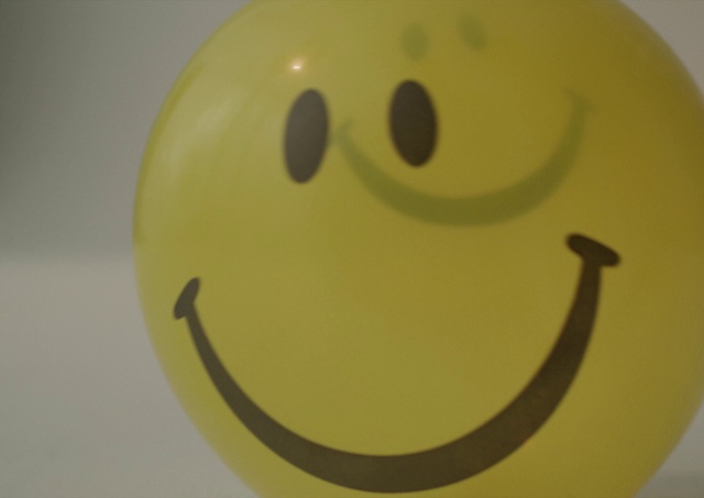 Video Reference: Smile, Facial expression, Emoticon, Smiley, Happy, Font, Material property, Circle, Button, Symbol